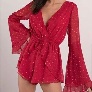 Tobi Red romper with white polka dots